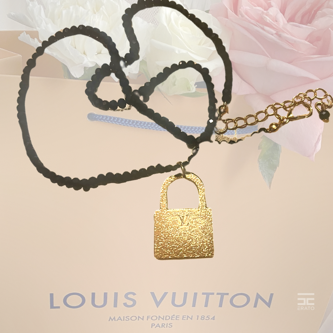 Louis Vuitton Gold and Black Beaded Necklace, Authentic LV Lock Charm