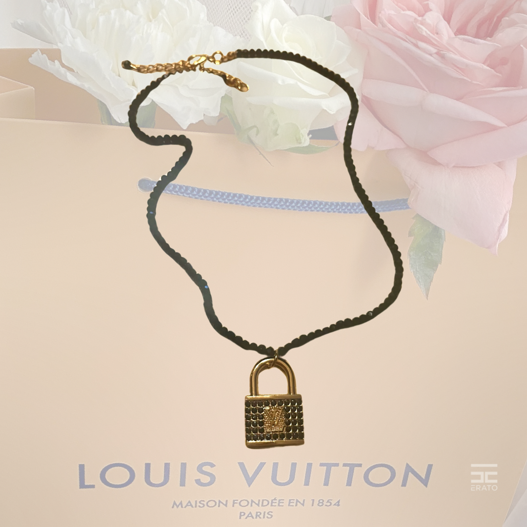 Louis Vuitton Gold and Black Beaded Necklace, Authentic LV Lock Charm